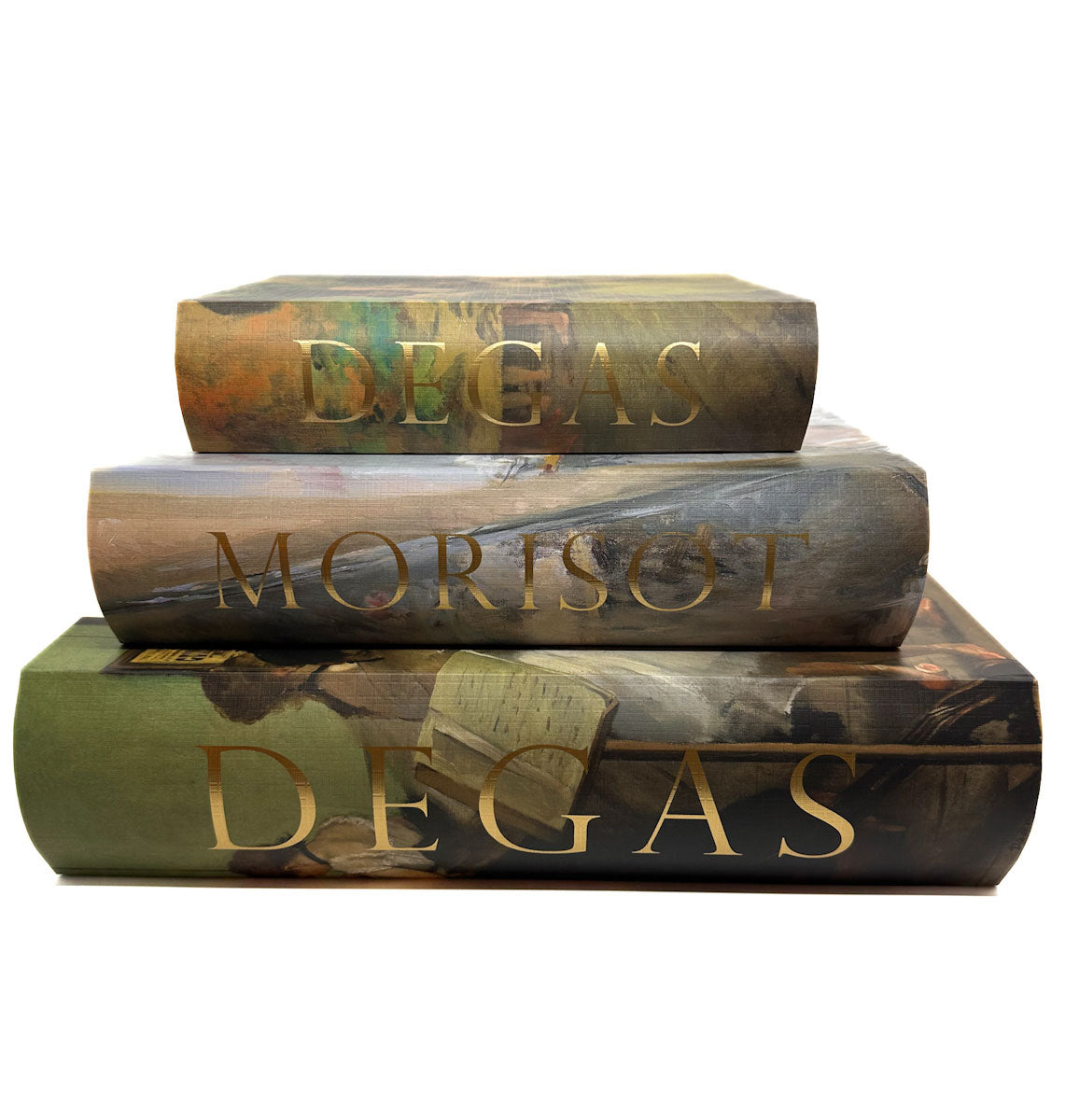 Three books stacked on top of each other with 'Degas' and 'Morisot' text on the spines.