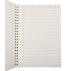 Open planner with monthly calendar and lined pages on a white background