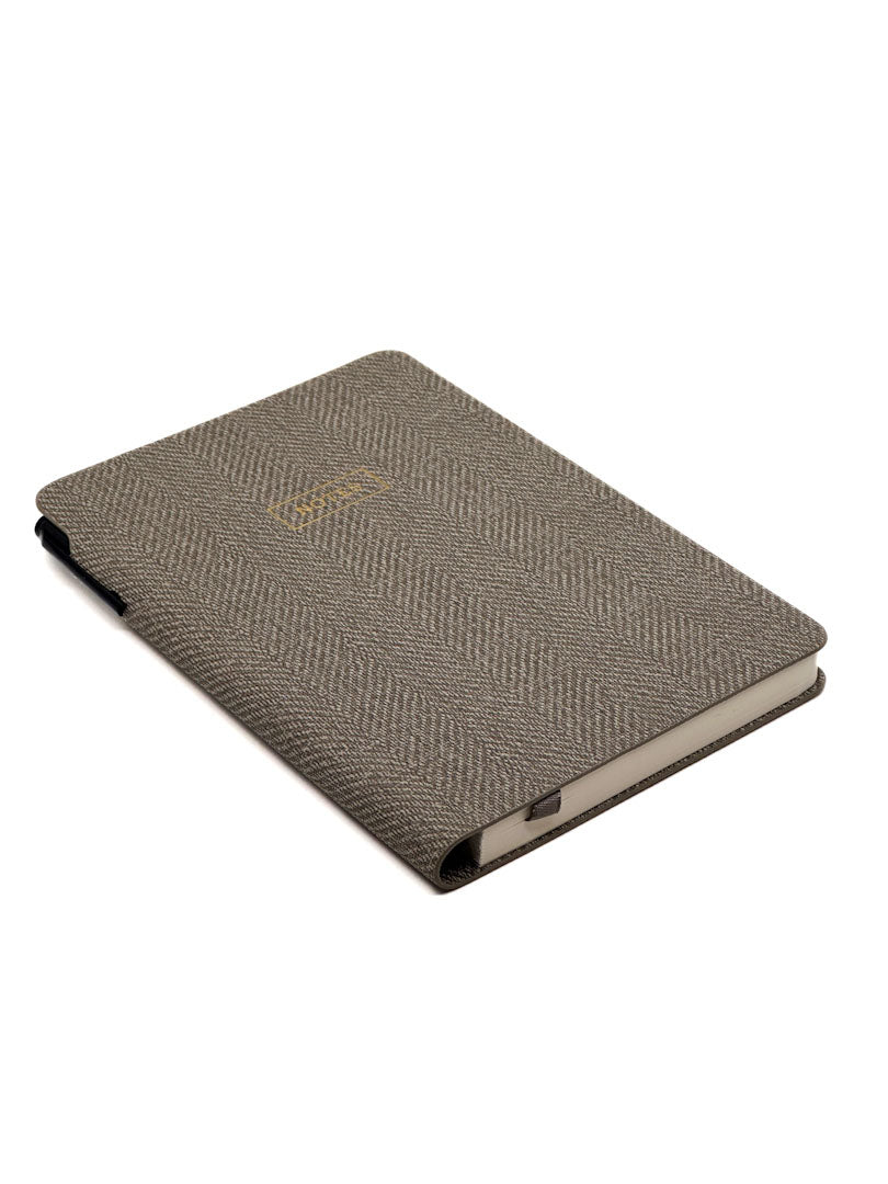 Eccolo tweed textured notebook on a white background