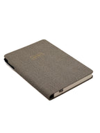 Eccolo tweed textured notebook on a white background