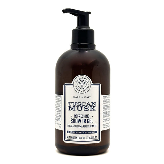 A 500 ml dark amber brown bottle of Tuscan Musk Shower Gel by Ferari Toscano, featuring a black pump dispenser and a white label with black text, set against a plain white background.