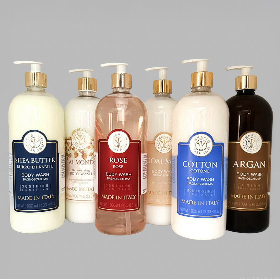 Erbario Toscano body wash collection with various scents and labels on a grey background