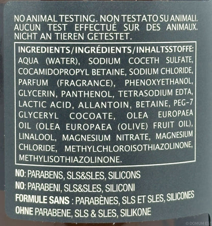 Product label with ingredient list and safety claims on a dark background