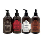 Four dark amber pump bottles of shower gel arranged side by side on a white background. The labels read Tuscan Wood, Tuscan Spices, Tuscan Musk, and Tuscan Sandalwood.