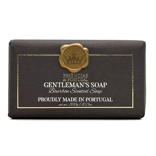 Essencias De Portugal bar of Gentleman's bourbon soap with a gold emblem on a white background