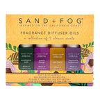 Packaging of Sand + Fog fragrance diffuser oils with four bottles on a yellow background
