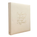 Rowhouse beige photo album with gold text on a white background