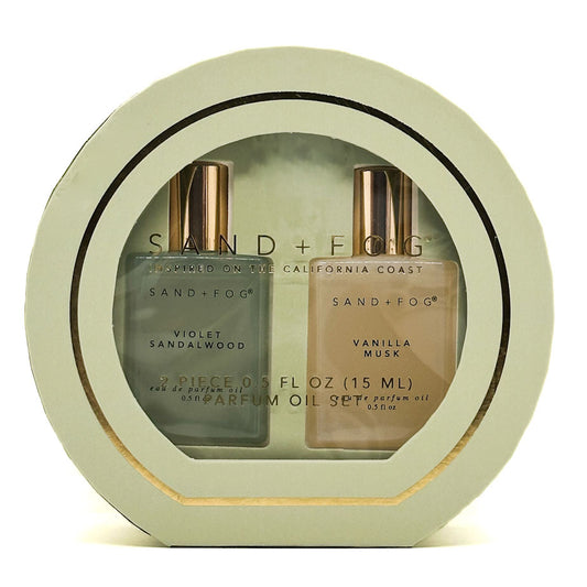 SAND + FOG Perfume oil discovery set in a circular display case with 'Sand + Fog' branding.