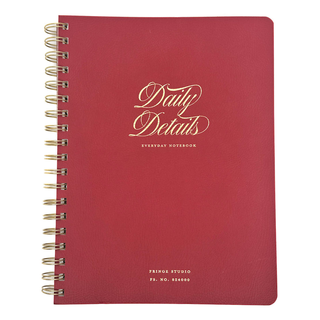 FRINGE Red notebook with 'Daily Details' branding on a white background