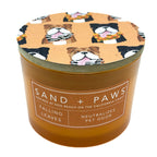 Falling Leaves Candle with dog-themed lid and 'Sand + Paws' label on a white background