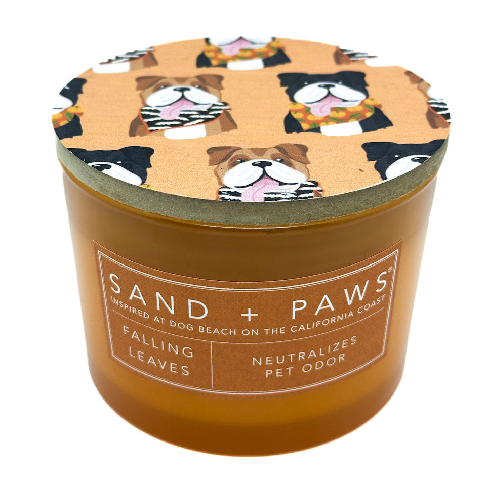 Falling Leaves Candle with dog-themed lid and 'Sand + Paws' label on a white background