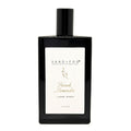 Black linen spray bottle labeled 'French Lavender' by Sand + Fog on a white background