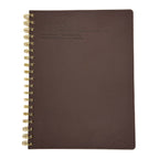 Fringe Studio Brown notebook with gold spiral binding on a white background