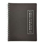 Fringe Studio black soft leather notebook with a white label on a white background