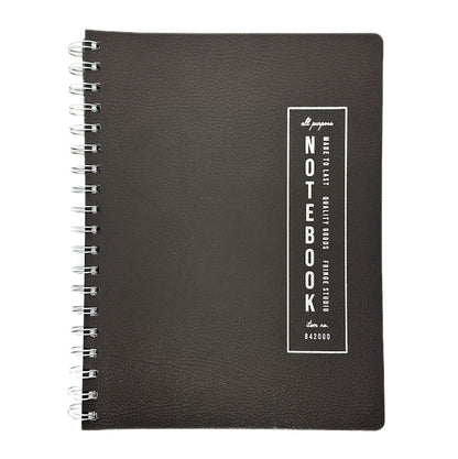 Fringe Studio black soft leather notebook with a white label on a white background