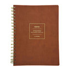 Fringe Studio brown loft leather notebook with gold spiral binding on a white background