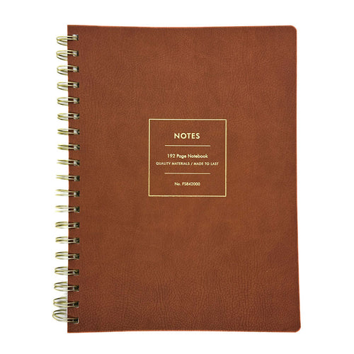Fringe Studio brown loft leather notebook with gold spiral binding on a white background