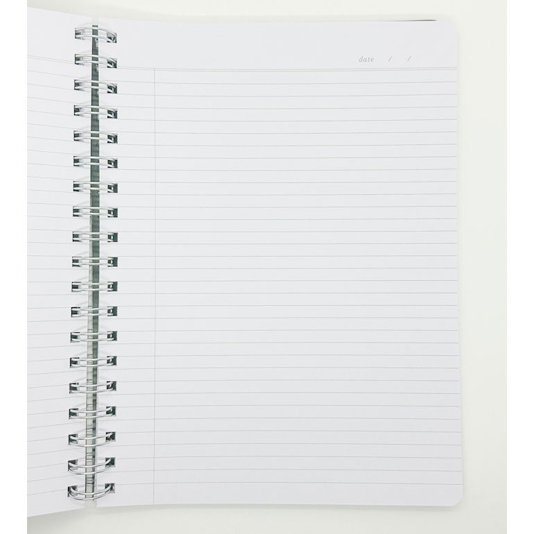 Fringe Studio Blank notebook with grid pages on a white background