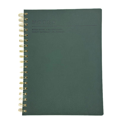 Fringe Studio green notebook with gold spiral binding on a white background