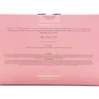 Pink box packaging for Sand & Fog candles with text and branding.