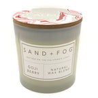 Goji Berry candle with wood lid and SAND + FOG label on a white background
