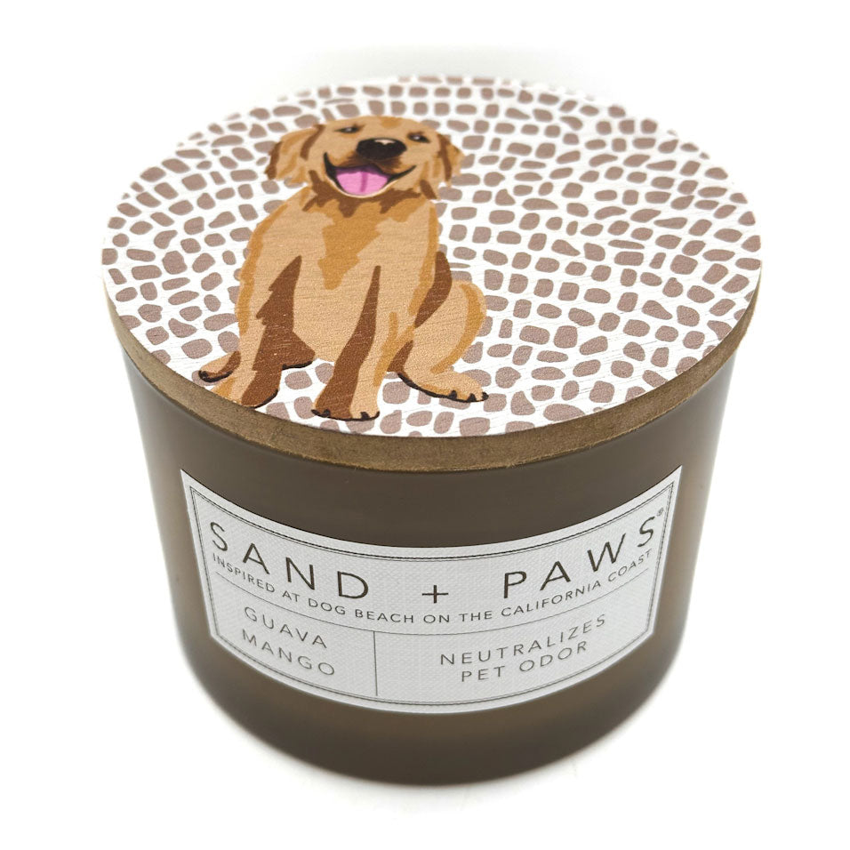 Guava Mango Candle with a dog illustration on the lid and 'Sand + Paws' branding.