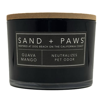 Guava Mango Black candle with 'Sand + Paws' label on a white background