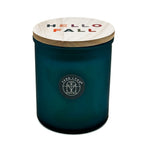 Falling Leaves candle by SAND +  FOG with 'Hello Fall' written on lid.