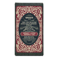 Bergamot + Leather bar of soap with decorative packaging on a white background