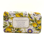 A rectangular bar of HOPIFICIO Firenze 'Italian Lemon' triple milled soap, wrapped in a white paper sleeve decorated with a vibrant yellow lemon and purple floral pattern, set against a plain white background.
