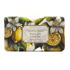 A rectangular bar of Horiﬁcio Firenze Tuscan Lemon soap, wrapped in a botanical illustration featuring lemons, green leaves, and white blossoms, with a central cream label.