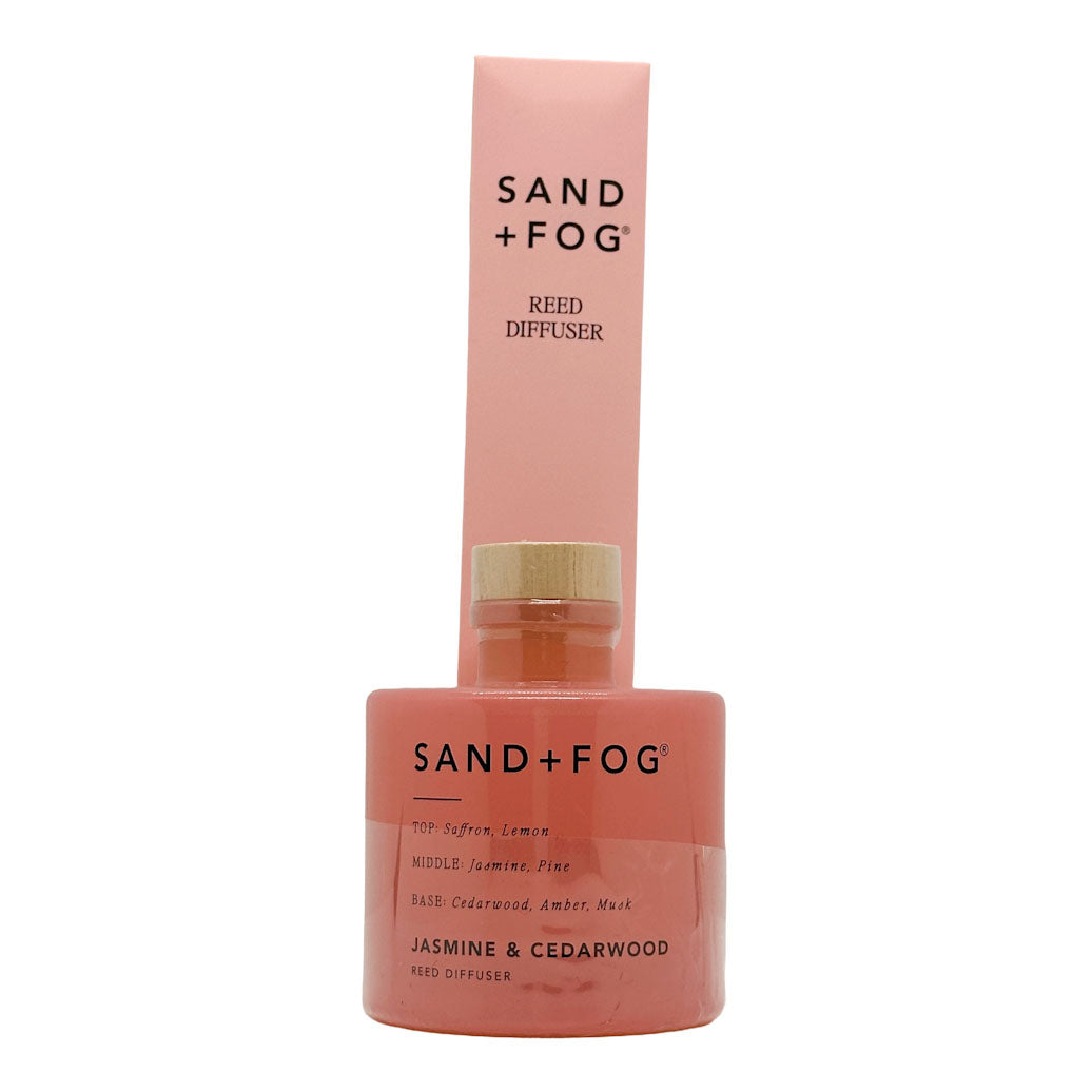 Pink bottle of Jasmine & Cedarwood Reed Diffuser - SAND + FOG