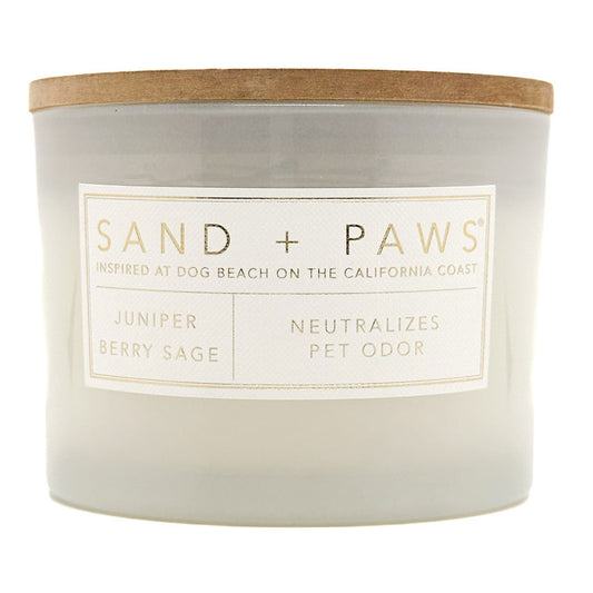 Juniper Berry Sage Candle with 'Sand + Paws' label on a white background