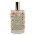 SAND + FOG Laundry day linen spray bottle with floral design on a white background