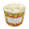 Candle container with lemon verbena design and 'Sand + Fog' branding on a white background