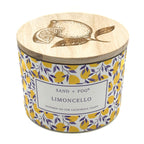 SAND + FOG Limoncello Candle with wooden lid featuring lemon design and 'Sand + Fog' branding.