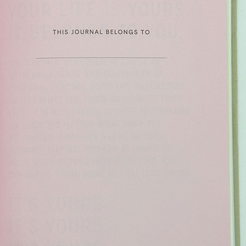 Journal cover with 'This Journal Belongs To' text on a pink and green gradient background