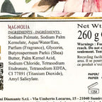 Product label with ingredients and branding details, featuring floral design at the top.