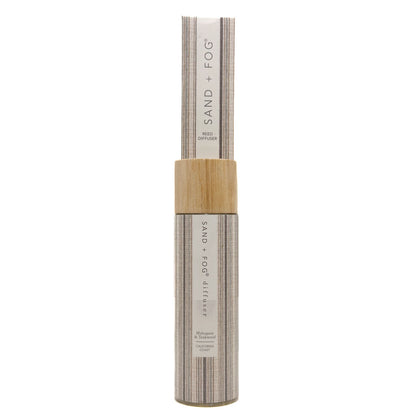 SAND + FOG Mahogany & Teakwood Scented diffuser with wooden cap on a white background