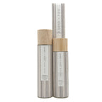 Sand + Fog Mahogany & Teakwood Home fragrance  with wooden caps on a white background