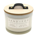 Mango Tangerine candle with wooden lid and Sand + Fog label on a white background