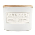 Mango Tangerine White Candle with 'Sand + Fog' label on a white background