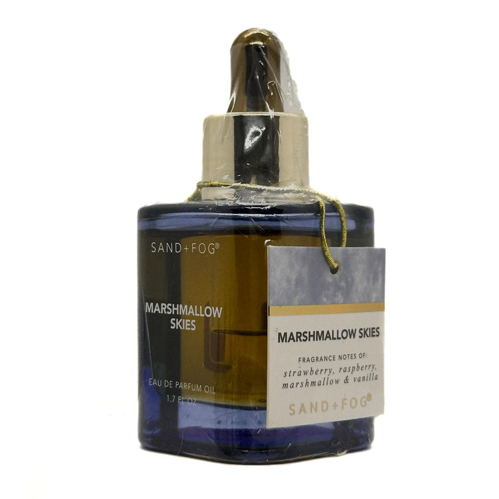 SAND + FOG Marshmallow Skies Perfume Oil bottle with a label on a white background