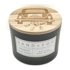 Grey candle with a wooden lid featuring 'Just Married' design, branded 'Sand + Fog'.