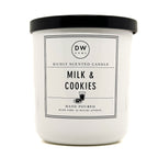 Milk & Cookies white candle with black lid and 'DW Home' label on a white background