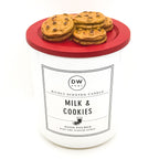 Candle with cookie-themed lid labeled 'Milk & Cookies' by DW Home on a white background