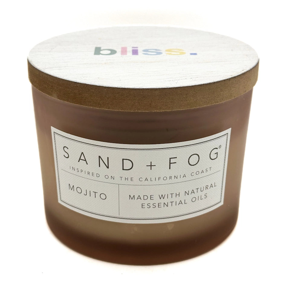 Mojito Candle jar with 'bliss.' lid and 'Sand + Fog' label on a white background