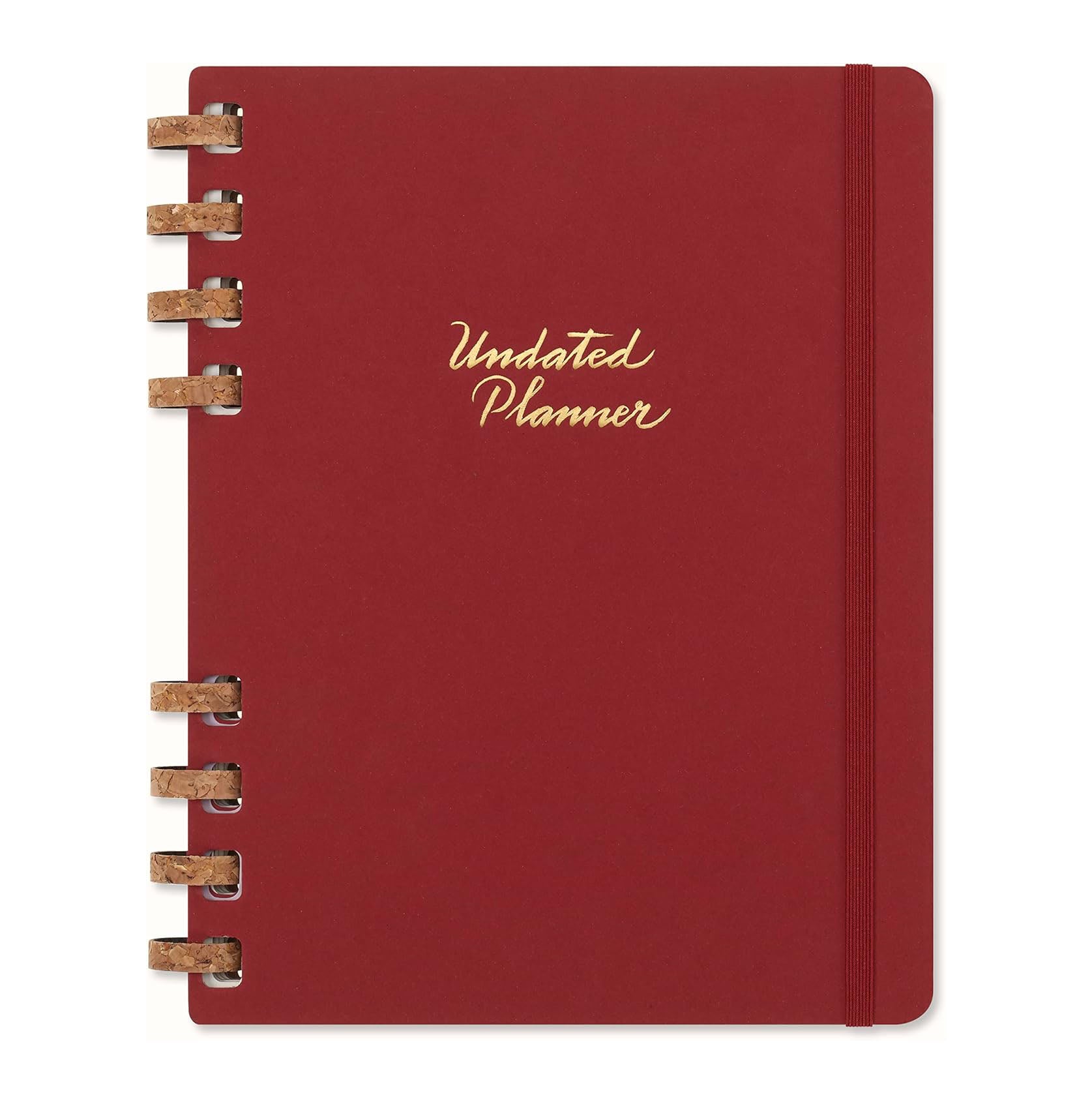 Moleskine red planner with gold text on a white background.