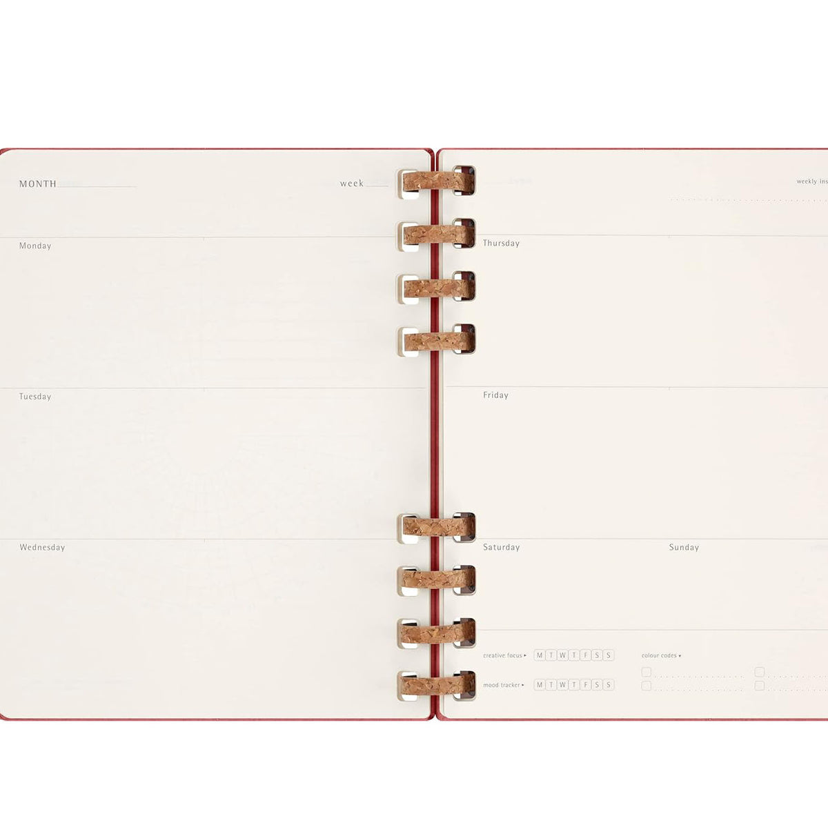 Open planner with weekly layout on white background