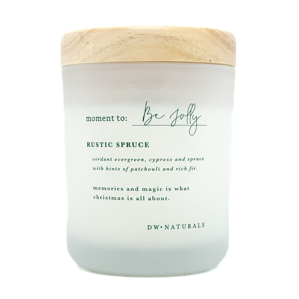 Moment to be Jolly candle by DW Home with wooden lid and text on a white background